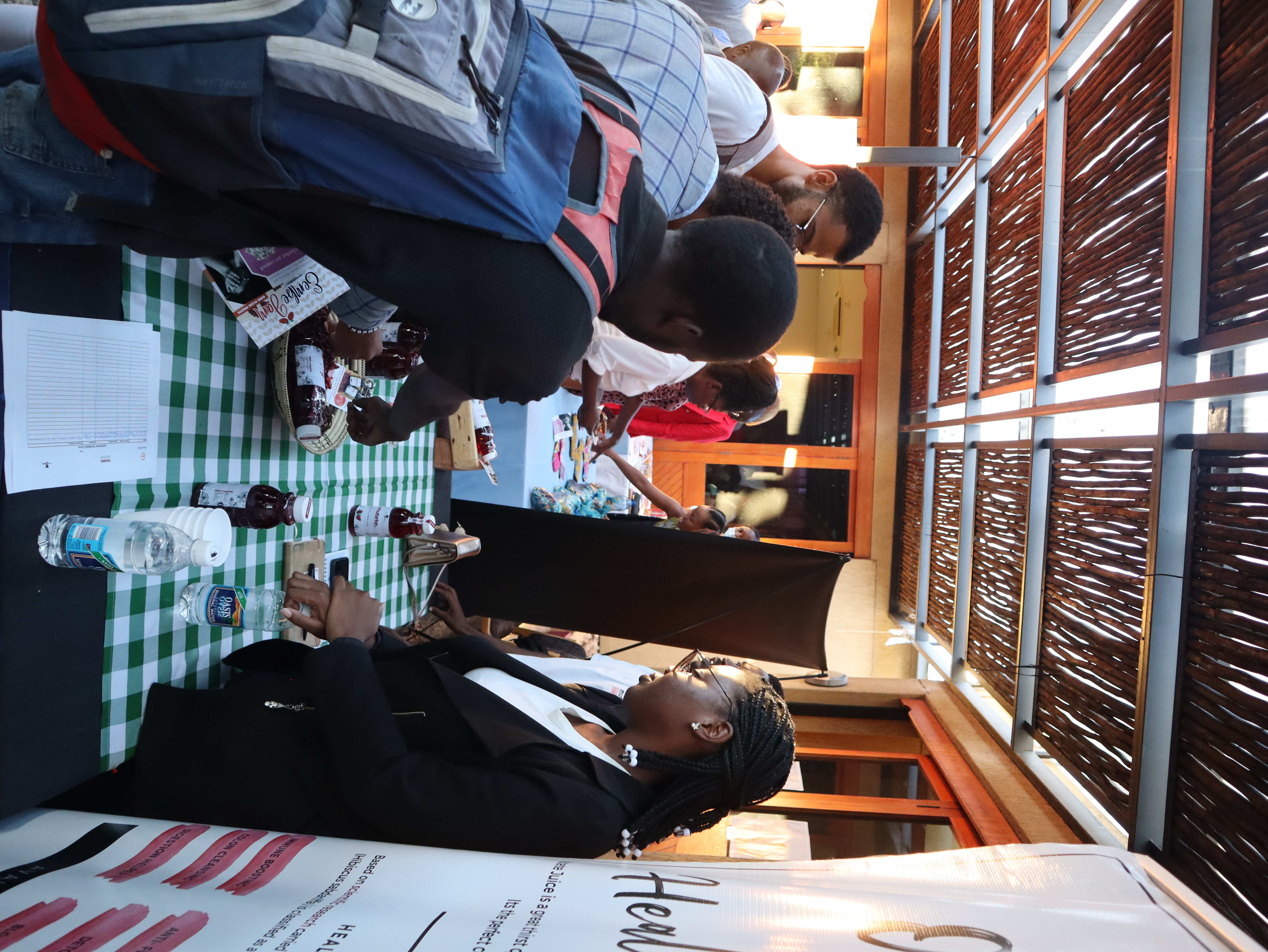 Guests sampling the products showcased by entrepreneurs at the SEEE Symposium.