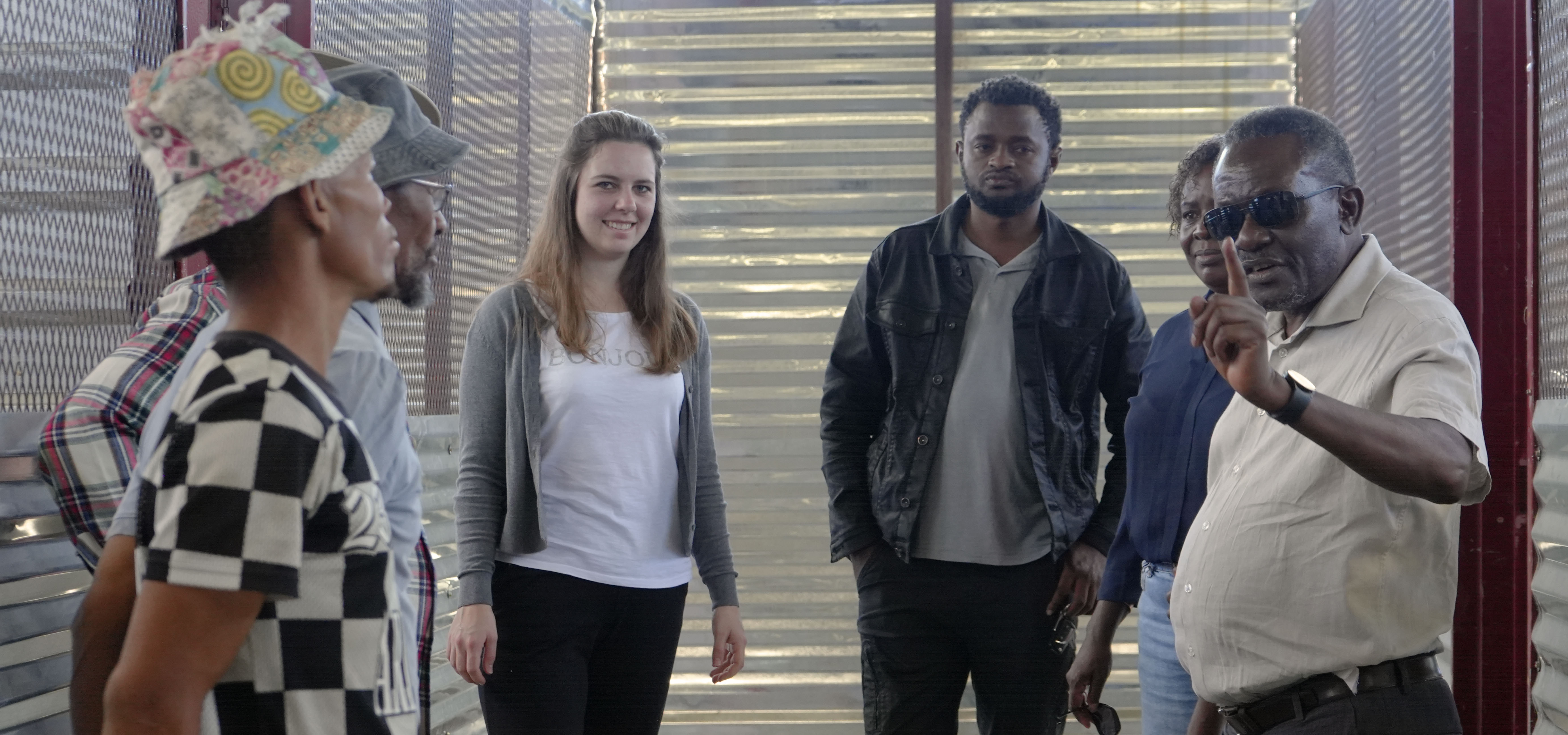 Prof James Katende, NUST’s Renewable Energy Systems expert explaining something to a group of people