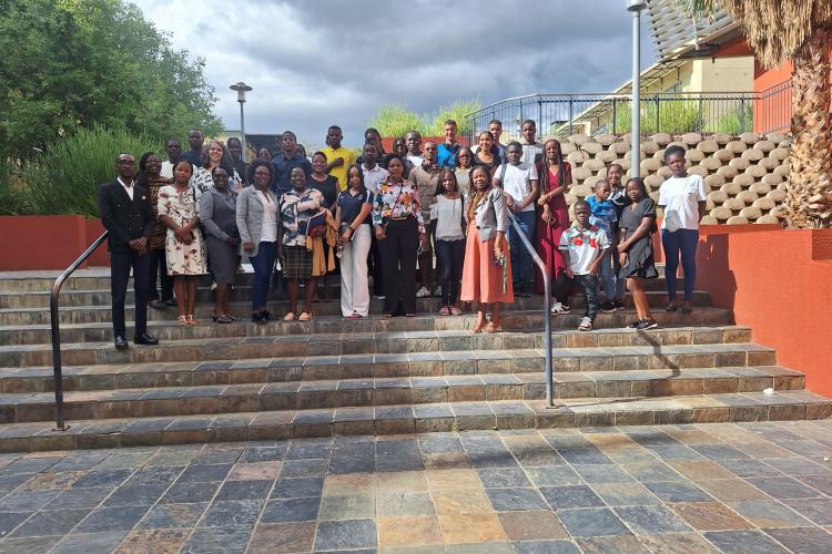 Mr Manuel Monteiro   teacher for Oil, Gas and Mineral Resources  and Coordinator of English language department (extreme left)  and  Ms Deolinda Bernardo a member of the local Government of Kwanza Sul province (fourth from left) pictured with NUST staff and students and their parents during their visit to NUST.