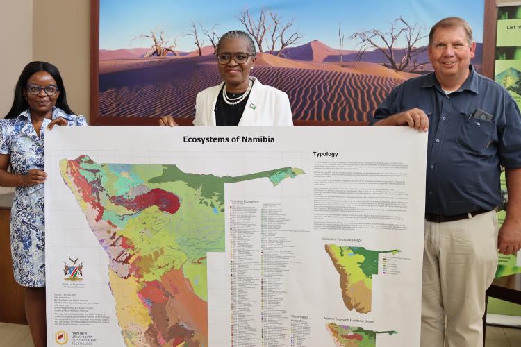 Minister and Prof Ben with Map