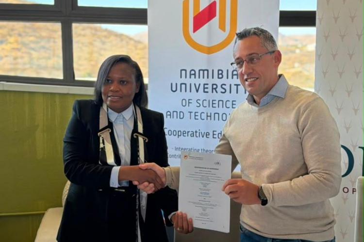 Prof Teresia with Oryx partner