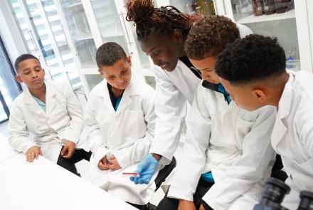 Showing sample to school kids