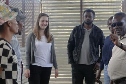 Prof James Katende, NUST’s Renewable Energy Systems expert explaining something to a group of people